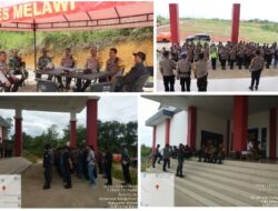 Personil TNI-POLRI Polres Melawi Kawal Ketat Perhitungan Suara Lanjutan Kec Sayan dilaksanakan di Gedung Gelora Center Nanga Pinoh Berjalan Aman dan Kondusif